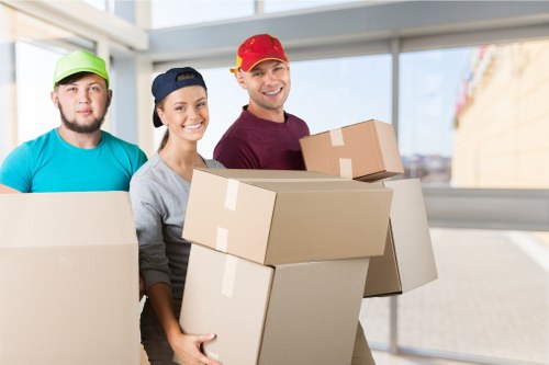 Commercial relocation process with packing and loading in progress