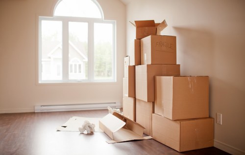 Packed boxes and furniture staged for a house move in Petersham