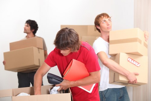 Furniture and boxes being loaded for a Petersham man with van move